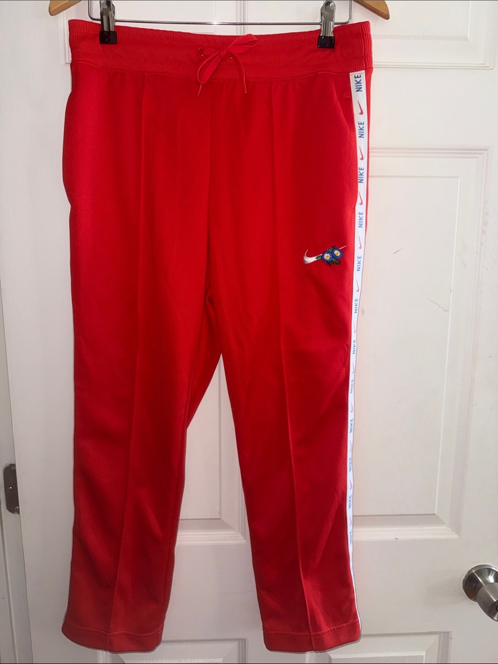 Nike Red Track Pants with White Logo Tape